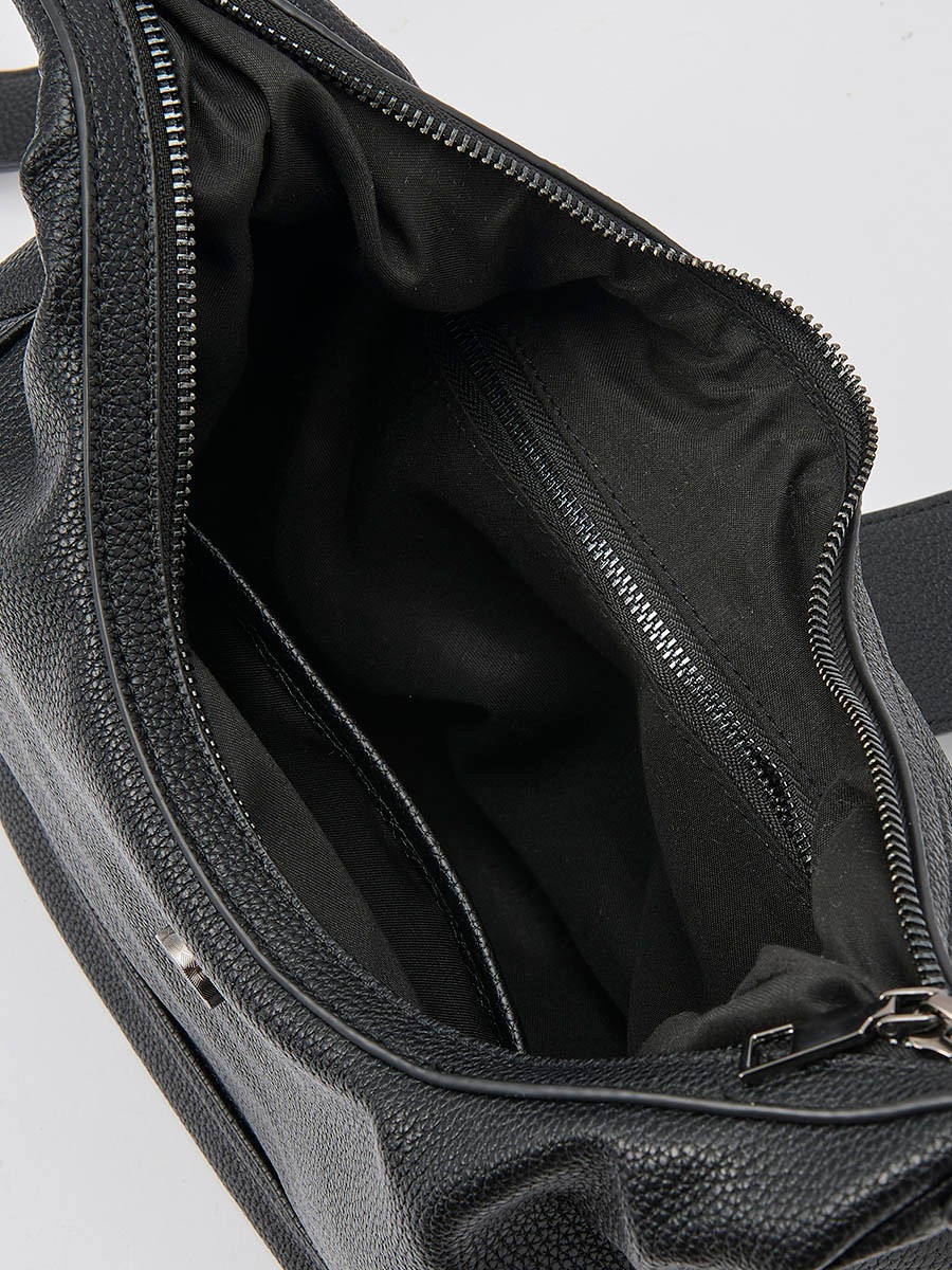 Faux leather women’s shoulder bag with top zipper closure, metal buckle detail and inner pocket.