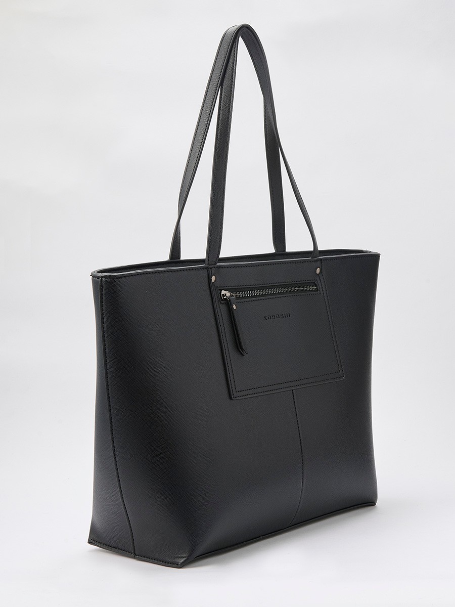 Large women’s shopper bag in faux leather with top zipper, interior pocket and removable zip pouch.