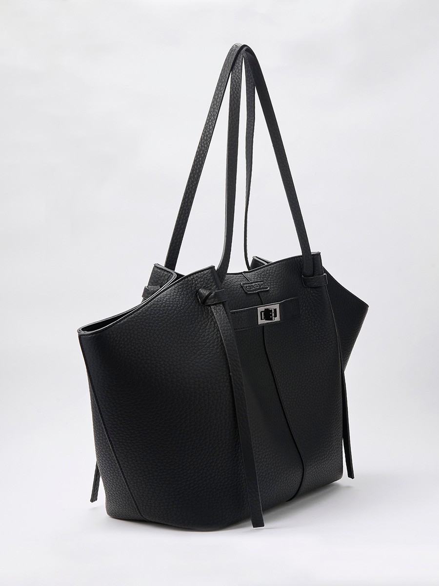 Large women’s shopper bag in faux leather with magnetic button closure and zip pouch inside.