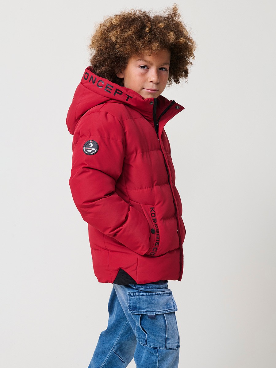 Blouson matelassé garçon rouge avec capuche doublée effet fourrure et fermeture zippée