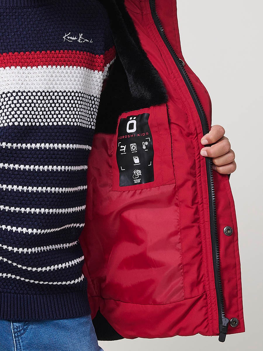 Blouson matelassé garçon rouge avec capuche doublée effet fourrure et fermeture zippée
