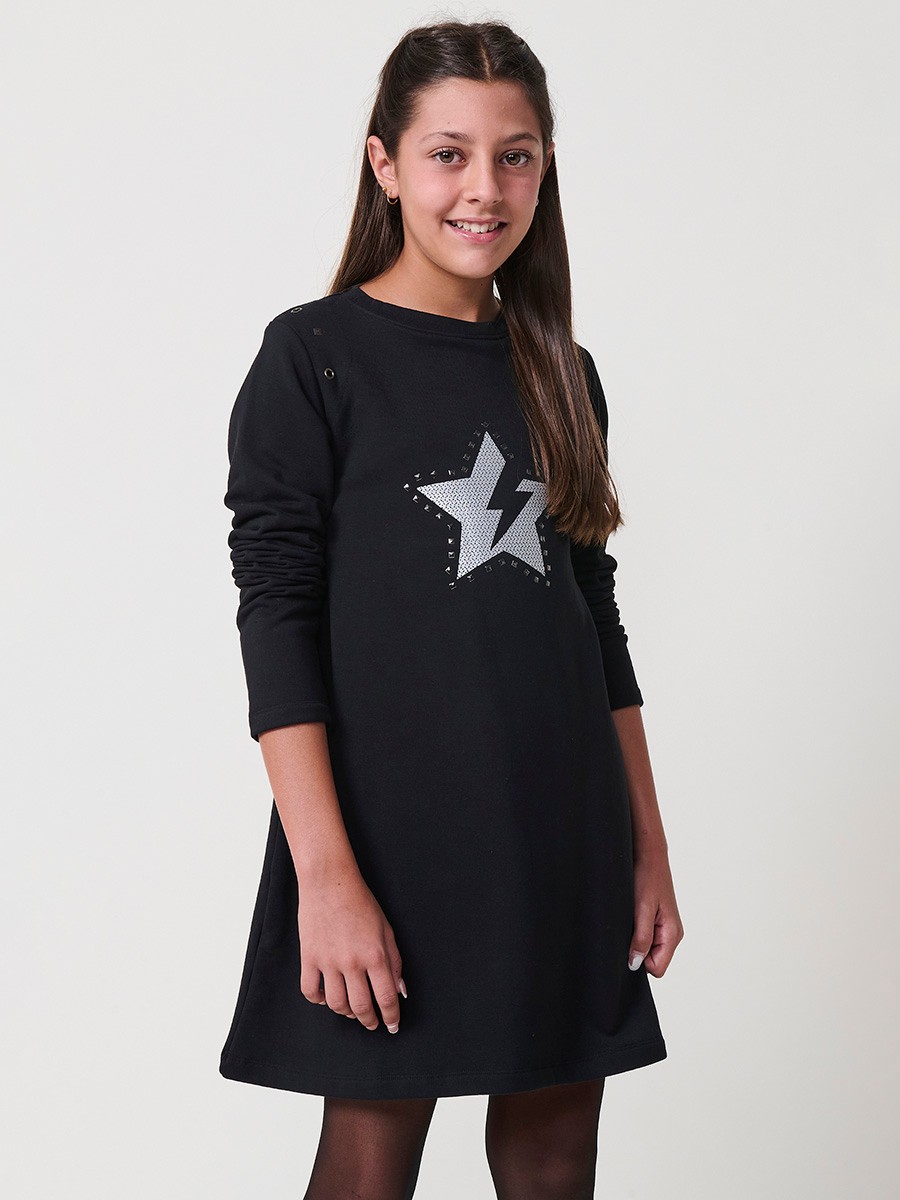 Robe fille noire en coton élastique, manches longues, col rond côtelé et motif étoile argentée avec clous décoratifs.