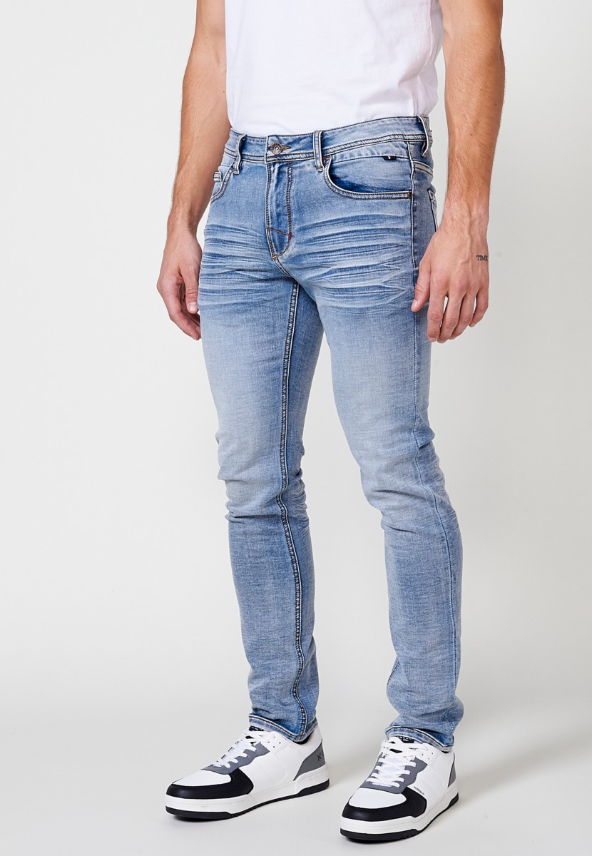 Jeans de hombre slim fit azul efecto lavado en knit denim 8