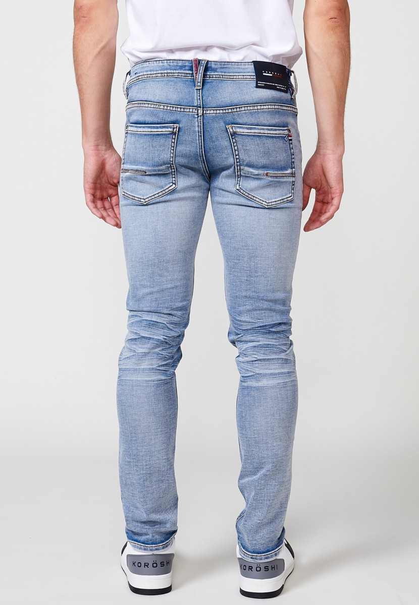 Jeans de hombre slim fit azul efecto lavado en knit denim 5