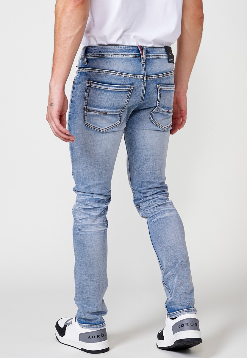Jeans de hombre slim fit azul efecto lavado en knit denim 7