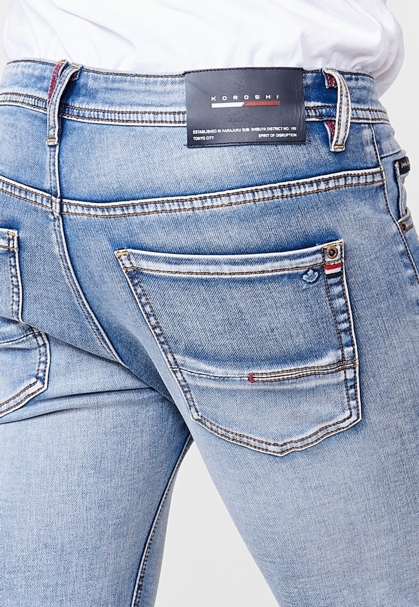 Jeans de hombre slim fit azul efecto lavado en knit denim 9